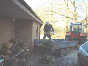 The farmer loading wood